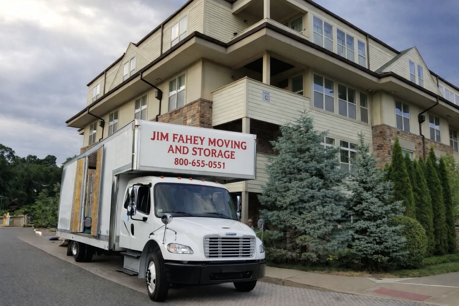Jim Fahey Moving & Storage Freightliner truck at a residential move in Connecticut